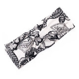 Floral cross hair band